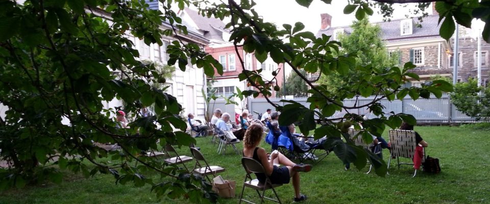 guests enjoy carillon concert on Wyck lawn